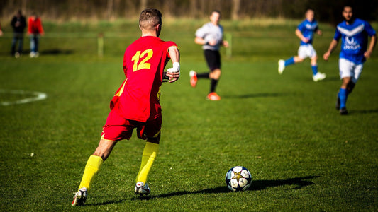 soccer teams playing a match