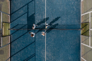aerial view of people playing paddle tennis