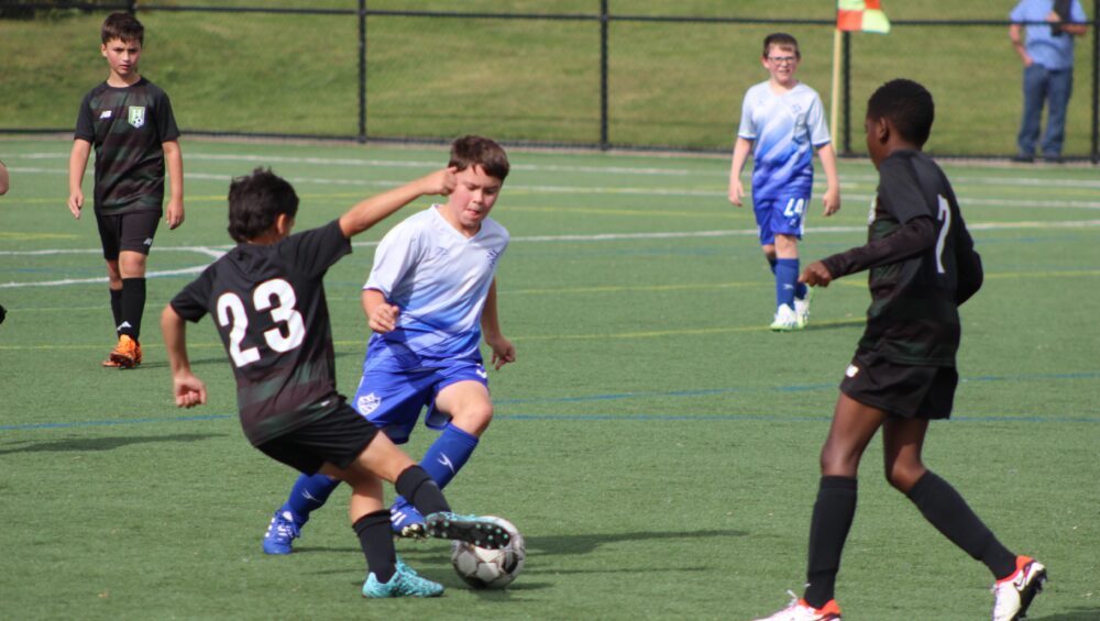 youth playing soccer