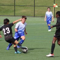 youth playing soccer