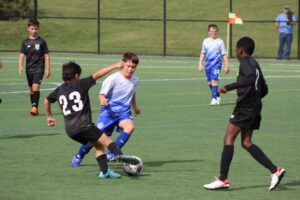 youth playing soccer